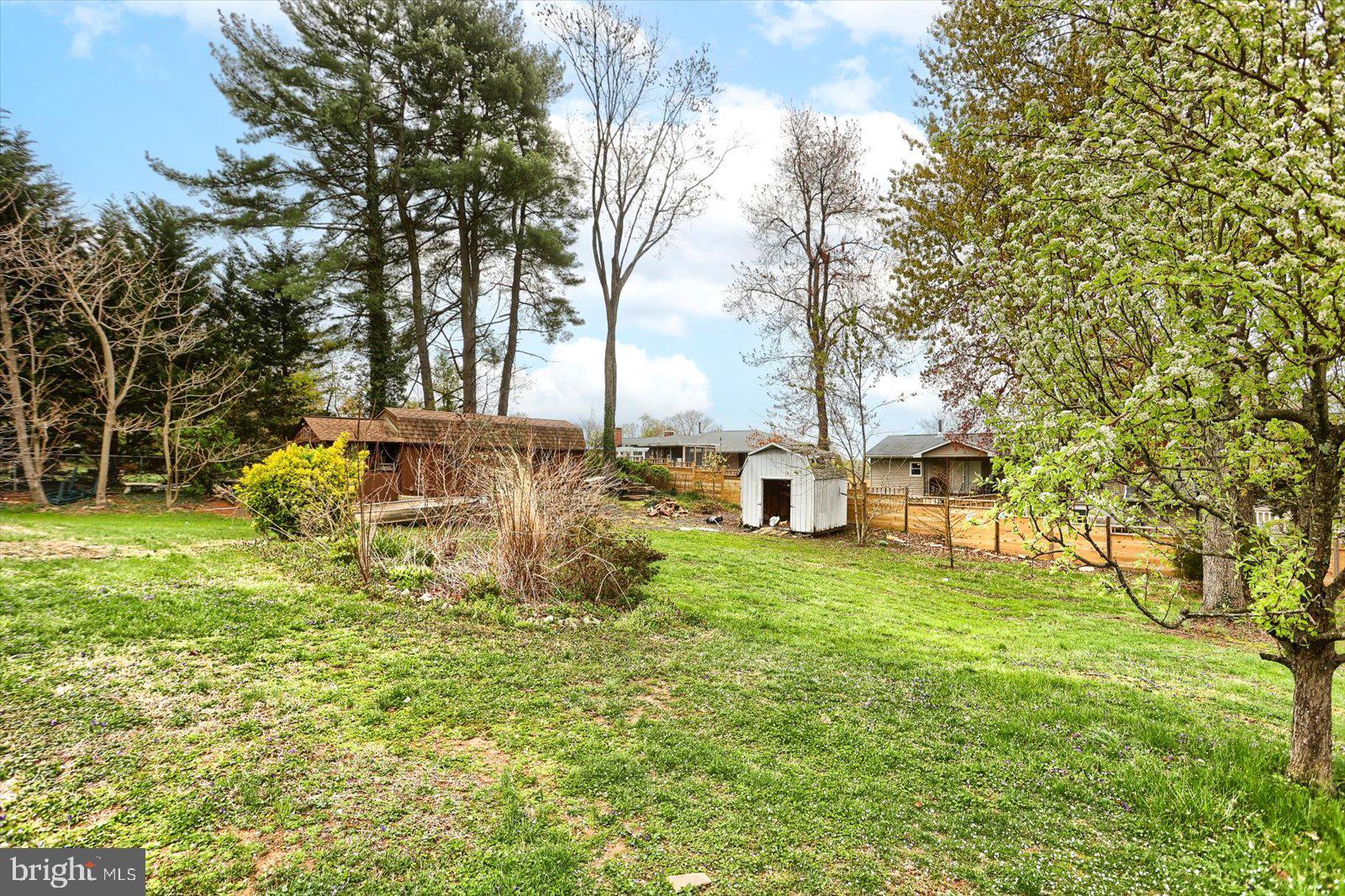 2301 Snow Road Edgewood, MD 21040 - Photo 38 of 41 a backyard of a house with table and chairs