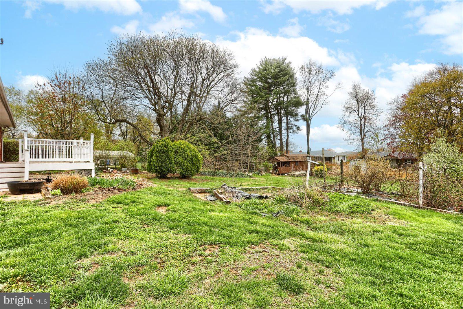 2301 Snow Road Edgewood, MD 21040 - Photo 39 of 41 a backyard of a house with table and chairs