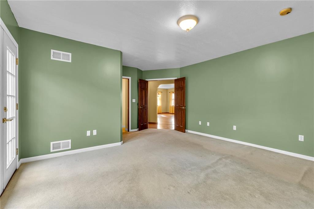 1601 Cottage Avenue Conway, PA 15027 - Photo 14 of 41 an empty room with windows and entrance