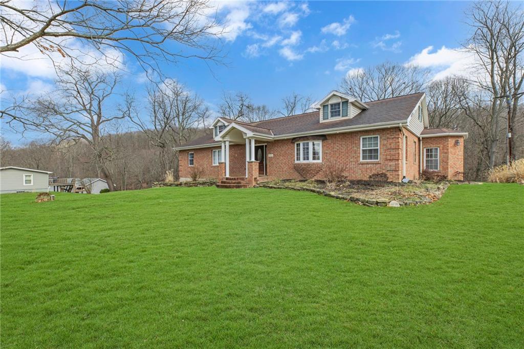 1601 Cottage Avenue Conway, PA 15027 - Photo 2 of 41 a front view of house with yard and green space