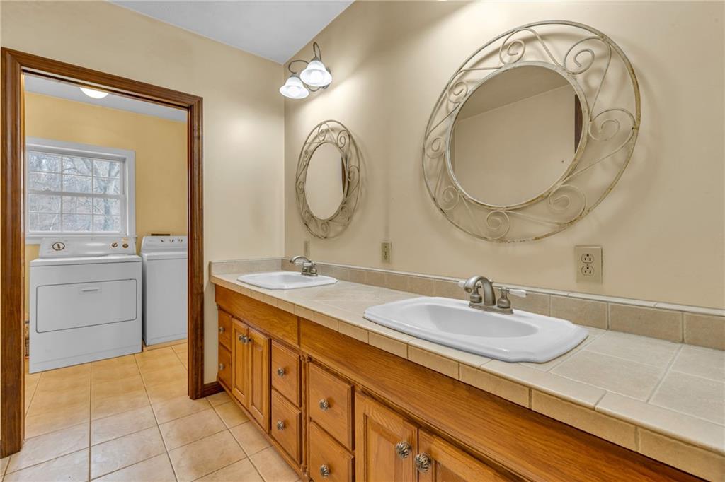 1601 Cottage Avenue Conway, PA 15027 - Photo 22 of 41 a bathroom with a sink and a mirror