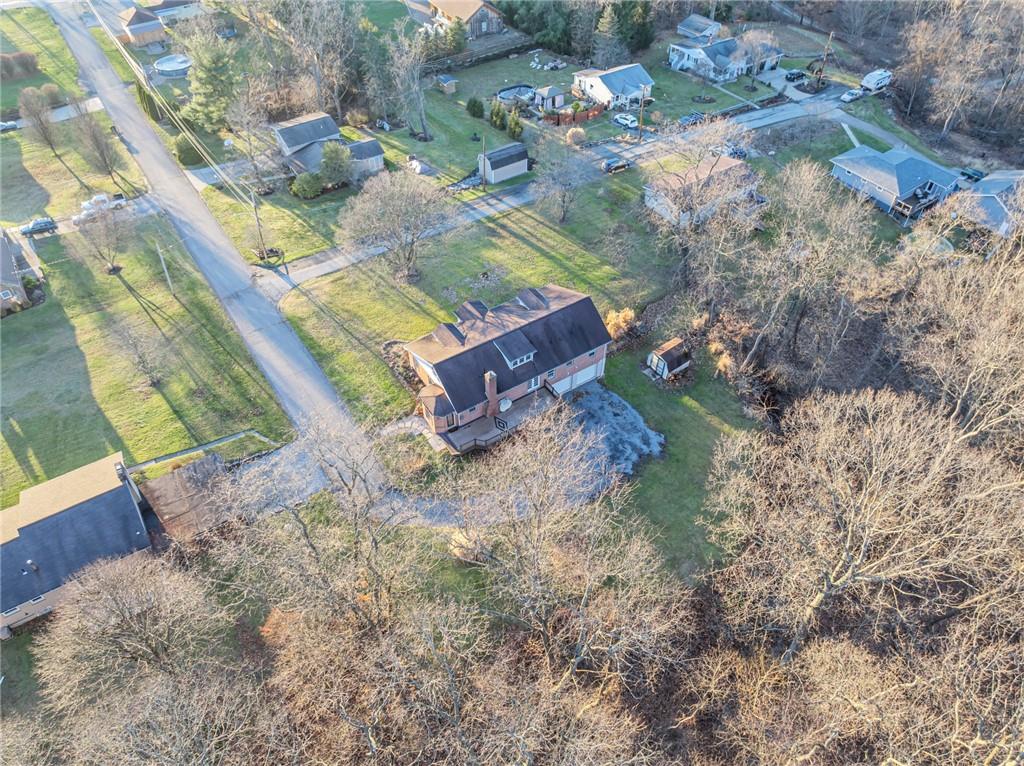 1601 Cottage Avenue Conway, PA 15027 - Photo 37 of 41 an aerial view of a house with a yard and lake view