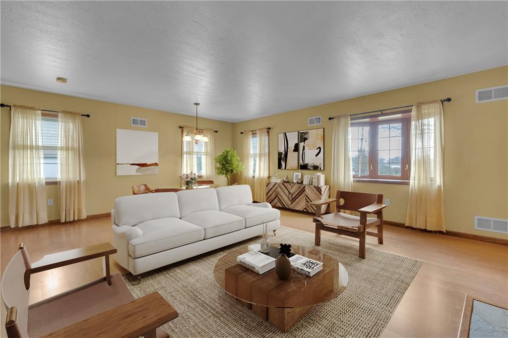 1601 Cottage Avenue Conway, PA 15027 - Photo 6 of 41 a living room with furniture and a potted plant