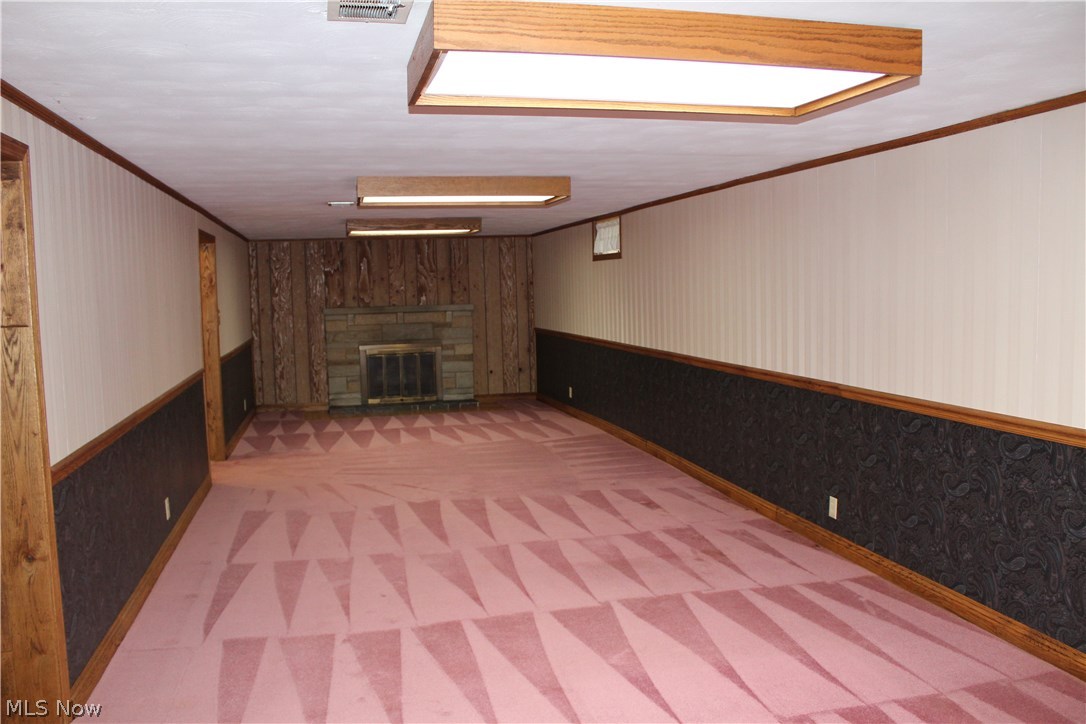 5807 East Sprague Road Independence, OH 44131 - Photo 25 of 33 Finished basement with wood burning fireplace, carpets were just cleaned