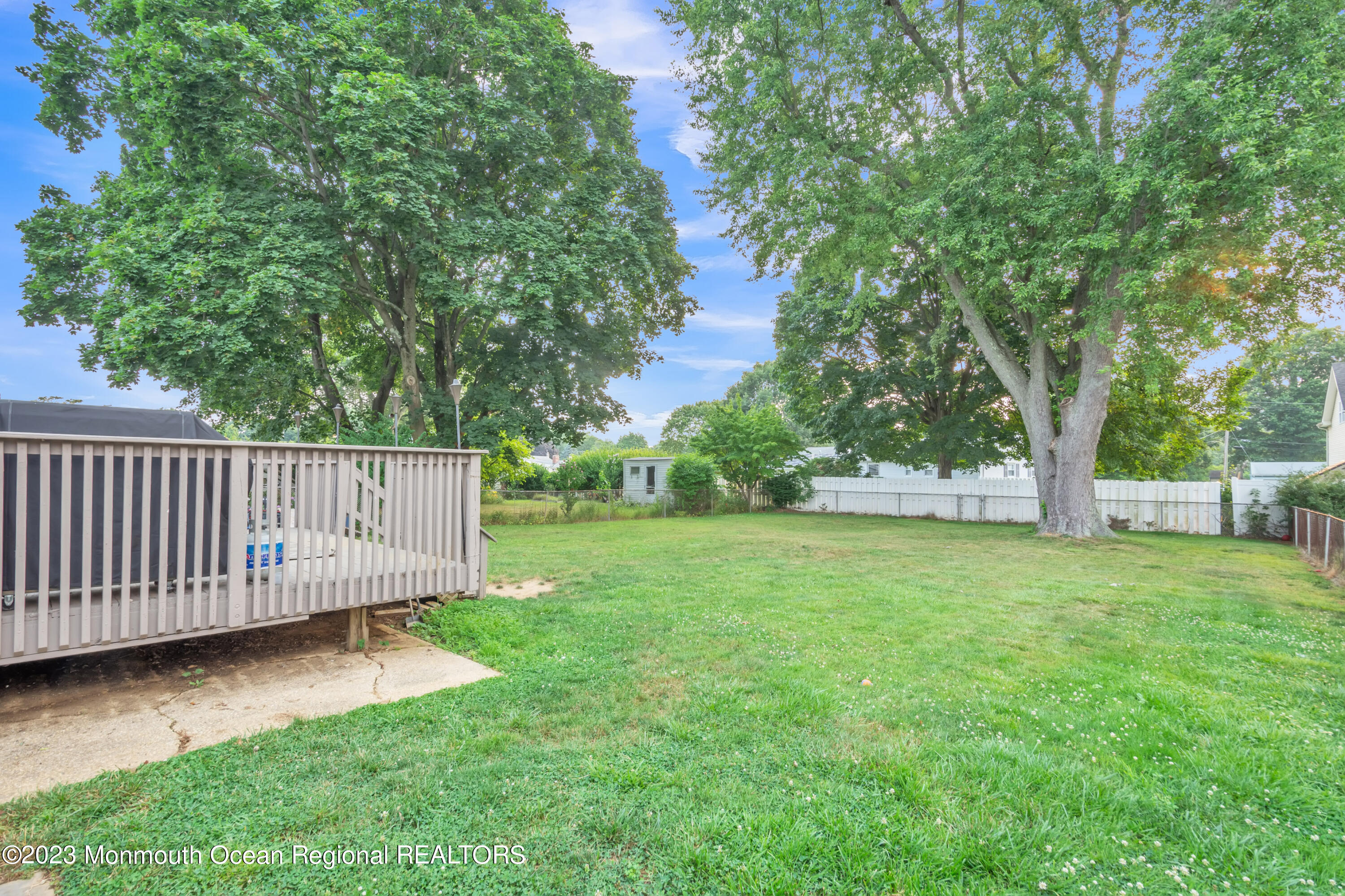 87 Cannon Road Freehold, NJ 07728 - Photo 27 of 29 a view of a deck with a small yard