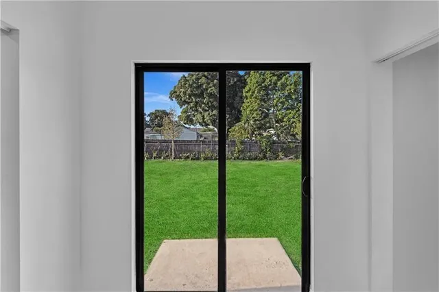 a view of a yard with a large trees