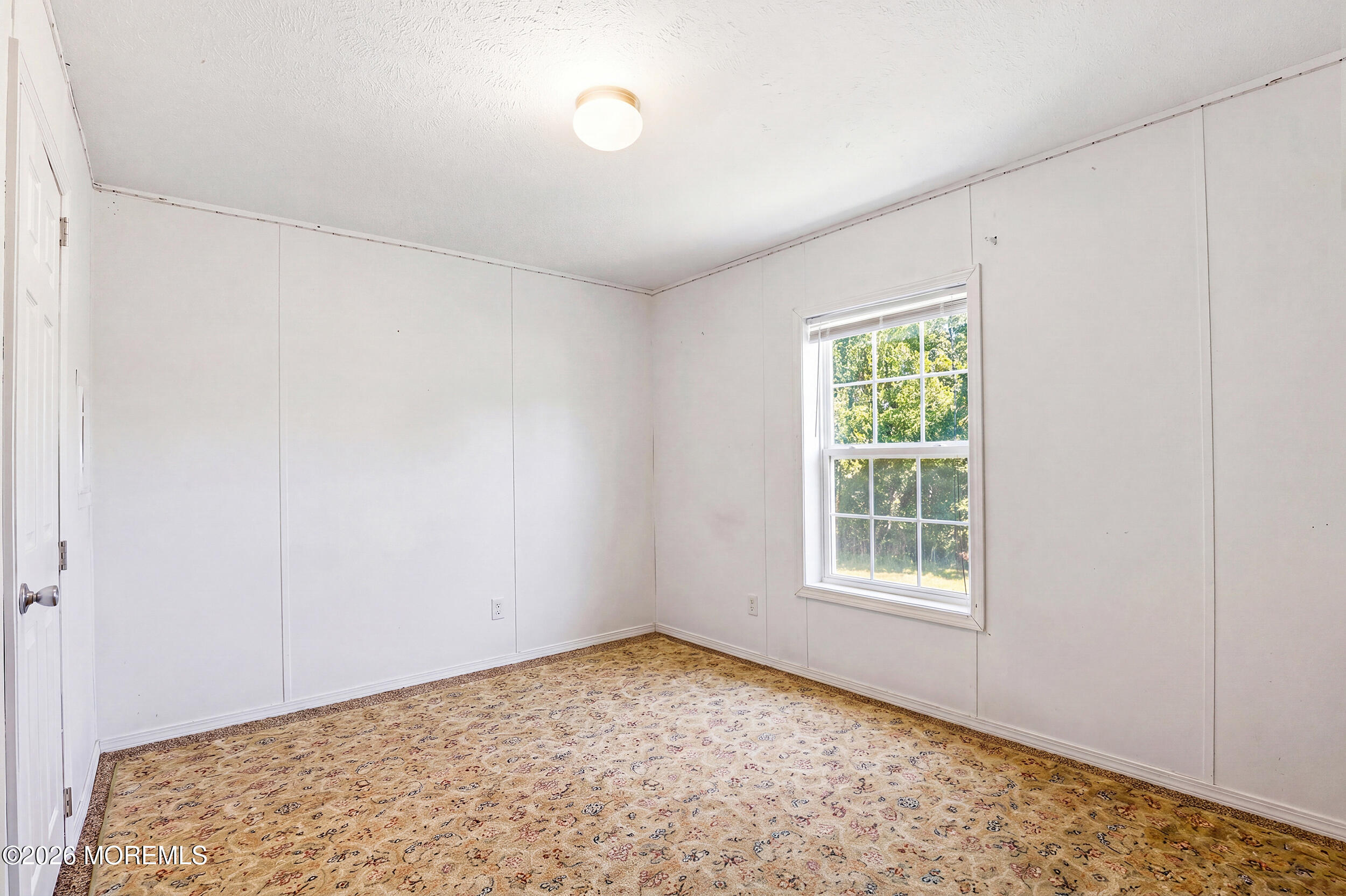 40 Locust Grove Hazlet, NJ 07730 - Photo 13 of 15 an empty room with a window