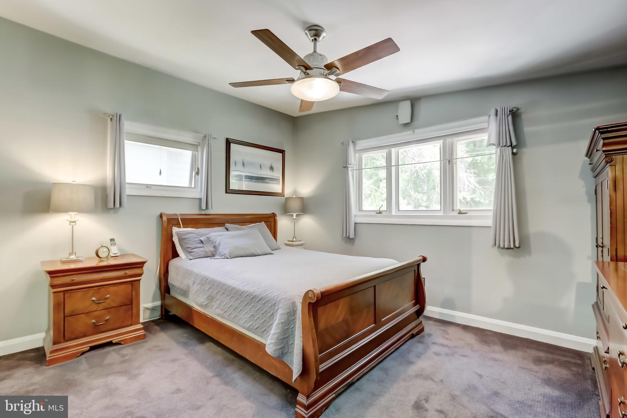 506 Upland Road Baltimore, MD 21208 - Photo 23 of 35 Bedroom with ceiling fan (carpet over hardwood)