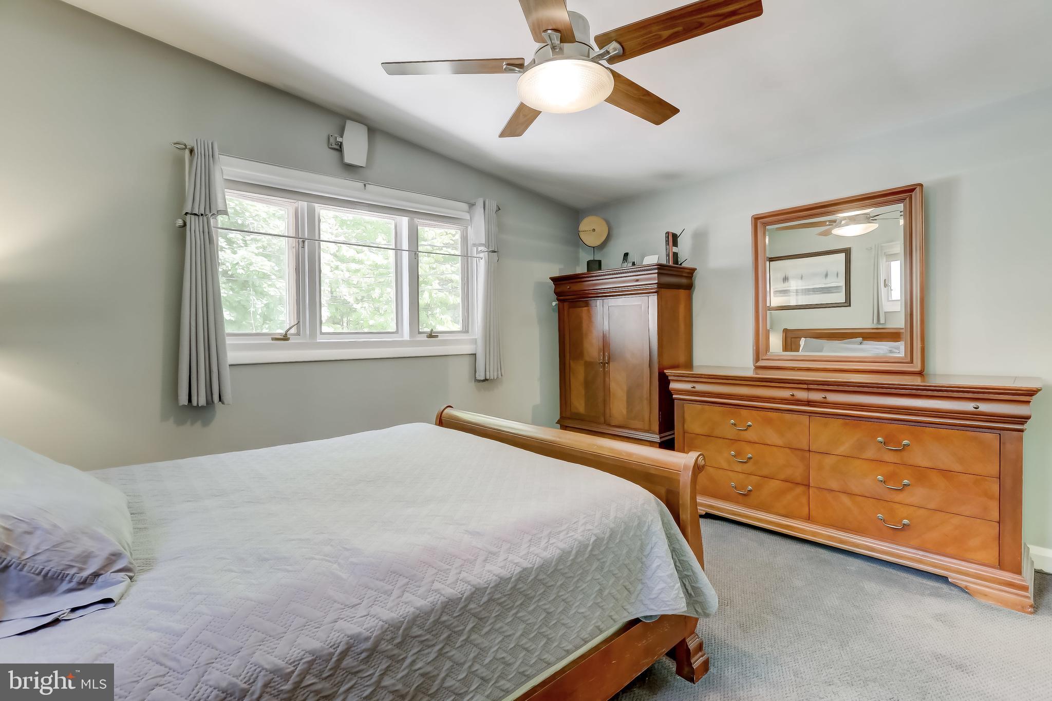 506 Upland Road Baltimore, MD 21208 - Photo 24 of 35 Bedroom with ceiling fan and lots of natural light