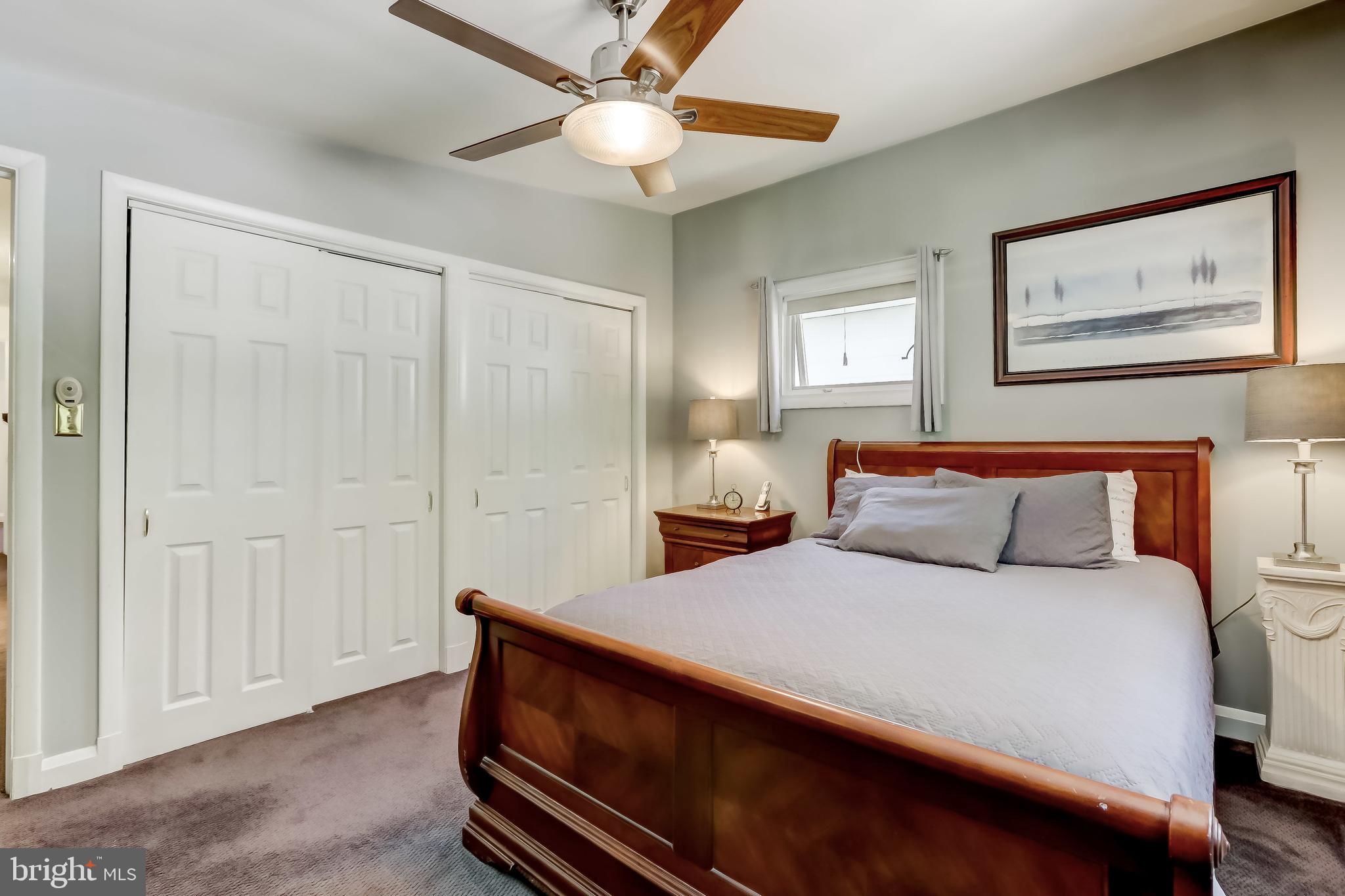 506 Upland Road Baltimore, MD 21208 - Photo 25 of 35 Bedroom with large closet (carpet over hardwood)