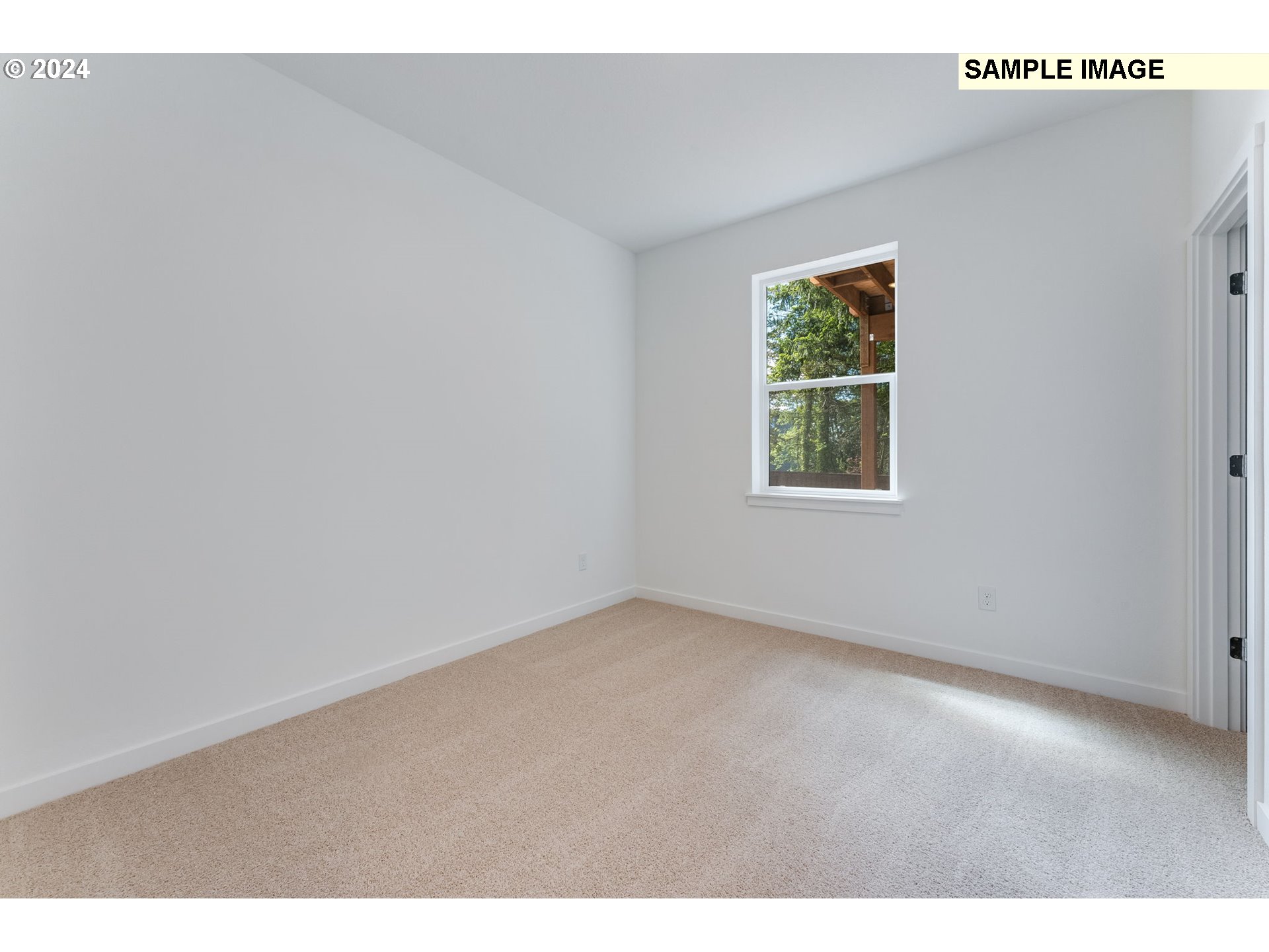 1120 West 15th Street La Center, WA 98629 - Photo 17 of 38 a view of an empty room with a window