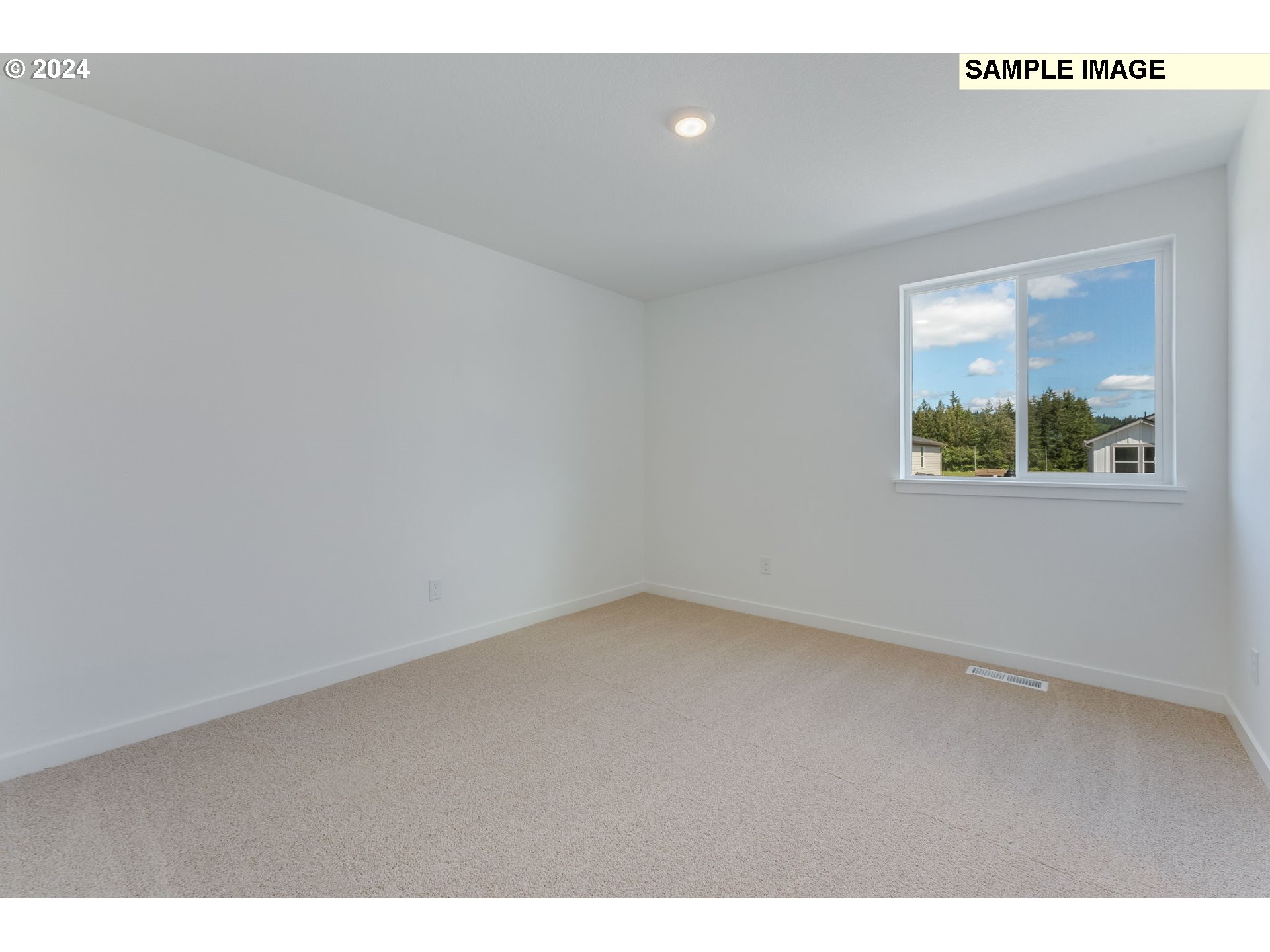 1120 West 15th Street La Center, WA 98629 - Photo 20 of 38 a view of an empty room and window
