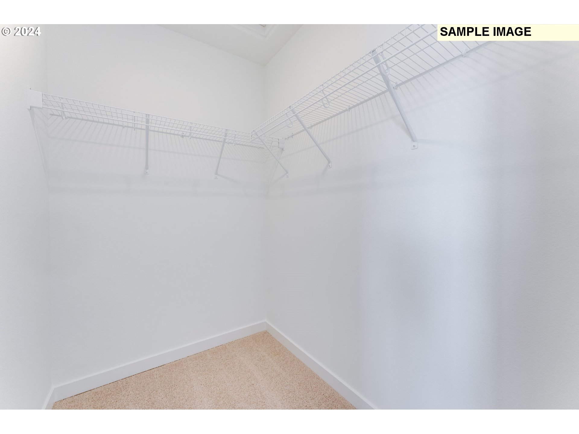 1120 West 15th Street La Center, WA 98629 - Photo 22 of 38 a view of a room with racks on the wall