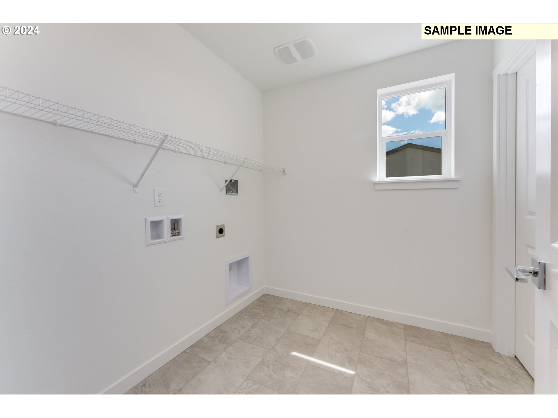 1120 West 15th Street La Center, WA 98629 - Photo 23 of 38 a view of an empty room with closet and wooden floor