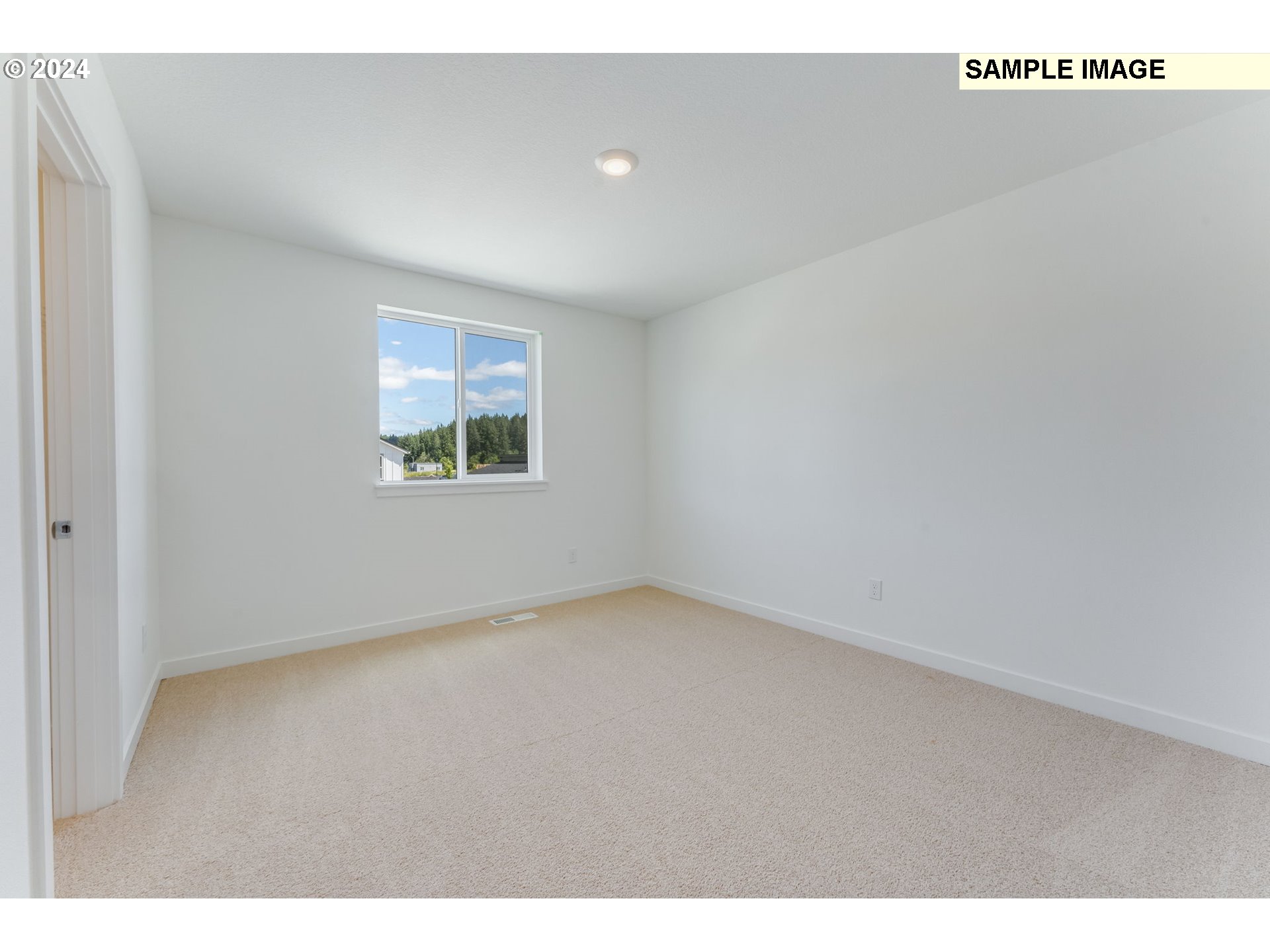 1120 West 15th Street La Center, WA 98629 - Photo 24 of 38 a view of an empty room with a window