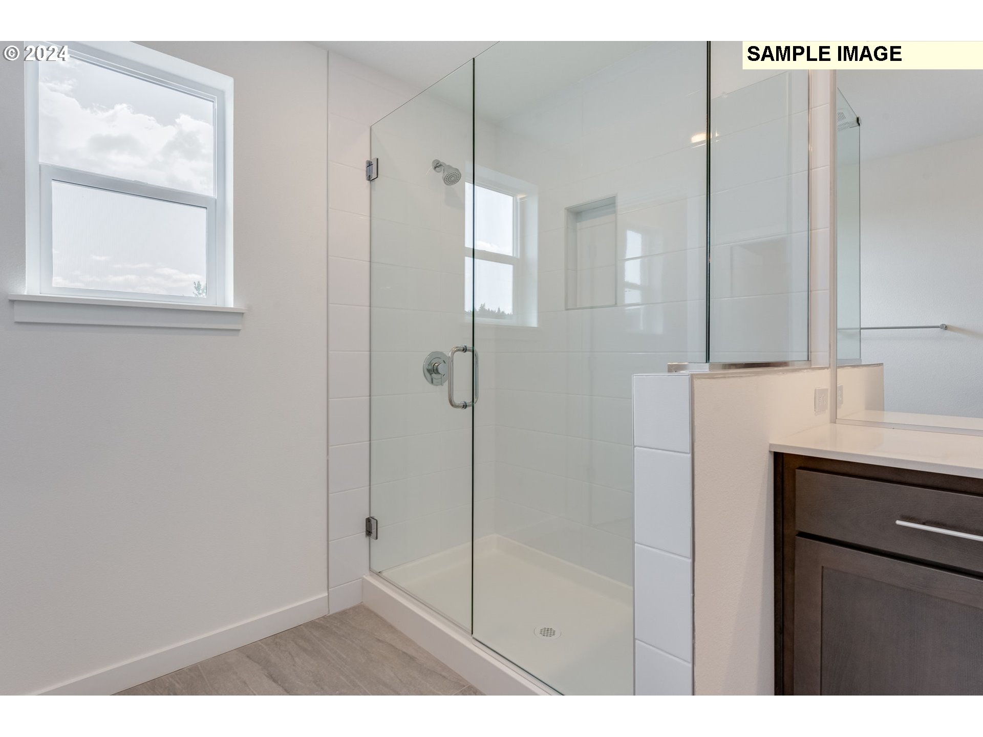 1120 West 15th Street La Center, WA 98629 - Photo 31 of 38 a bathroom with a shower and a sink