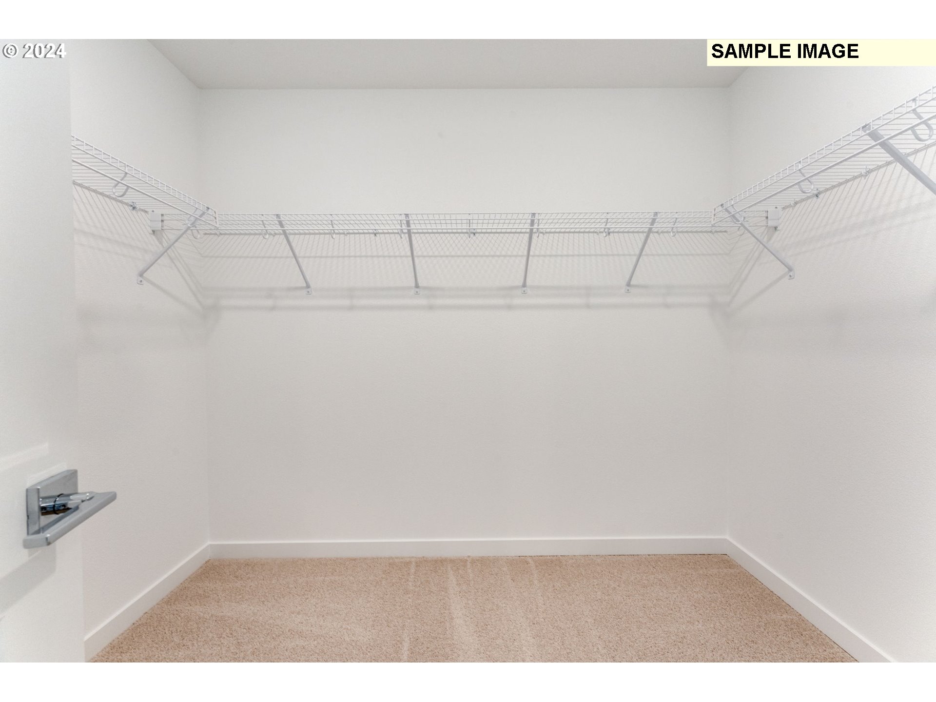 1120 West 15th Street La Center, WA 98629 - Photo 32 of 38 a view of a room with racks on the wall
