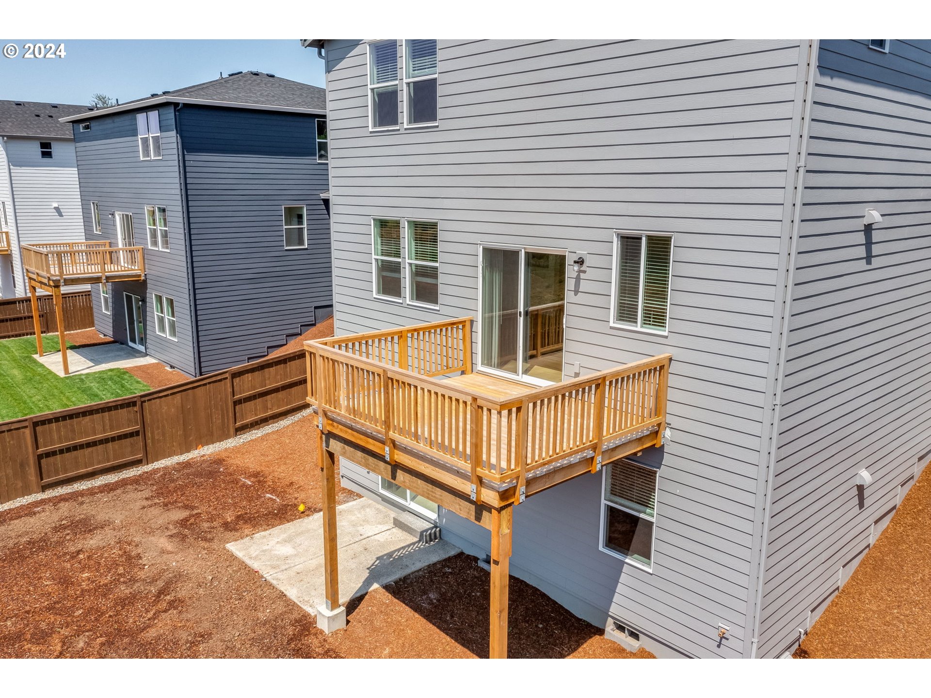 1120 West 15th Street La Center, WA 98629 - Photo 35 of 38 a view of a house with wooden deck