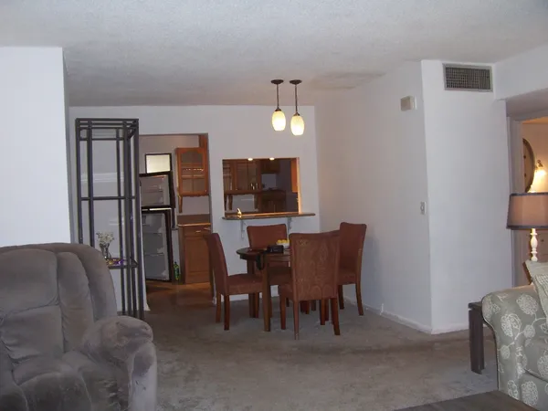 a view of a livingroom with furniture
