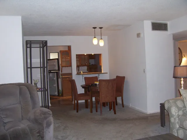 a view of a livingroom with furniture