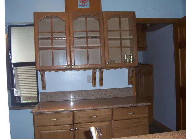 a view of staircase with white walls