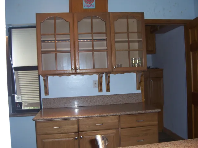 a view of staircase with white walls