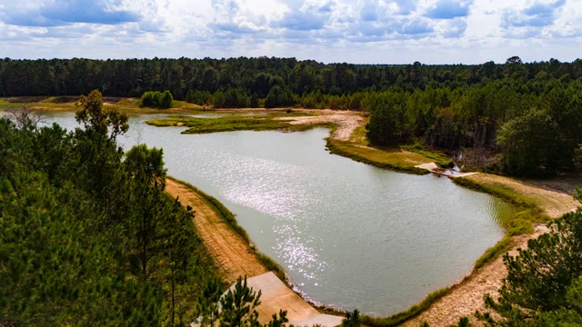 a view of a swimming pool with a lake view