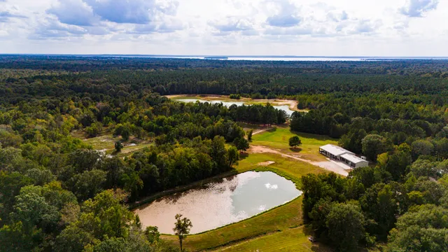 a view of a swimming pool and lake view