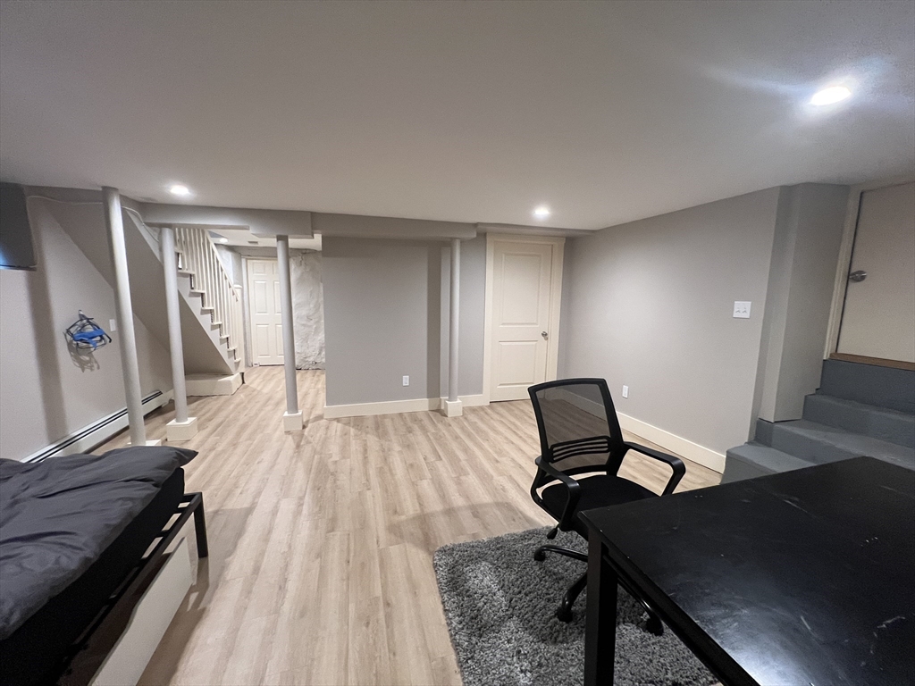 39 Snow Street, Unit 1 Boston, MA 02135 - Photo 21 of 35 a view of a livingroom with furniture