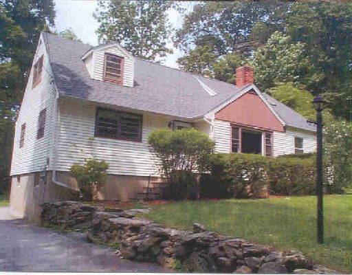 46 Highview Road Ridgefield, CT 06877 - Photo 1 of 1 a front view of a house with garden