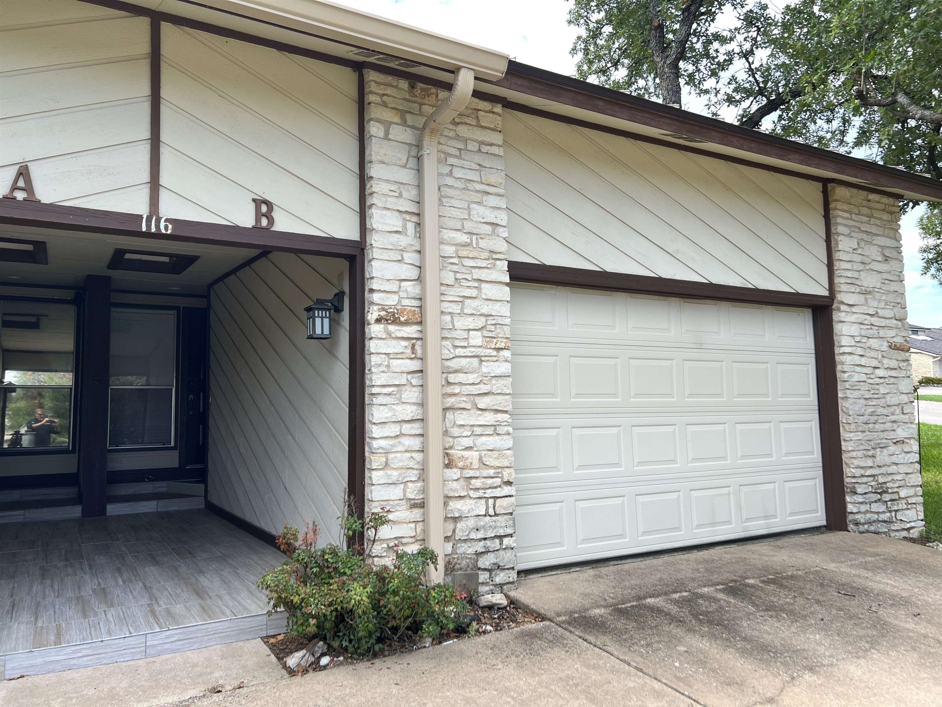 116 Dawn, Unit B Horseshoe Bay, TX 78657 - Photo 22 of 24 a side view of a house
