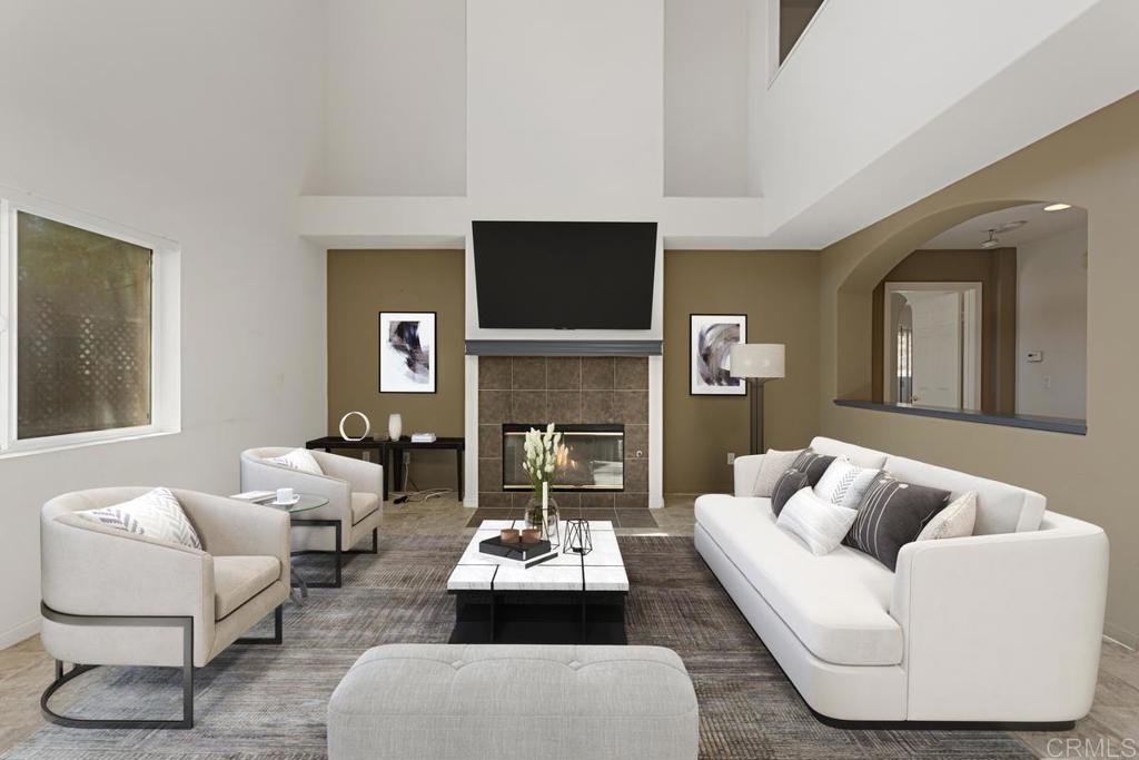 1691 Hubbard Place Escondido, CA 92027 - Photo 12 of 39 a living room with furniture and a flat screen tv