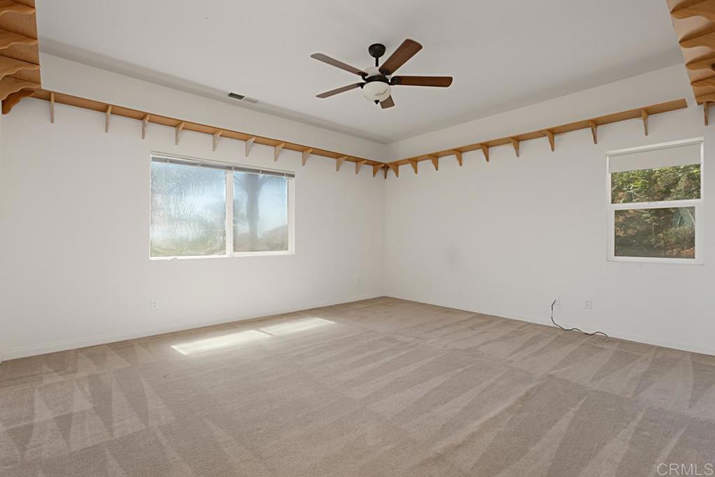 1691 Hubbard Place Escondido, CA 92027 - Photo 33 of 39 a view of an empty room with a window