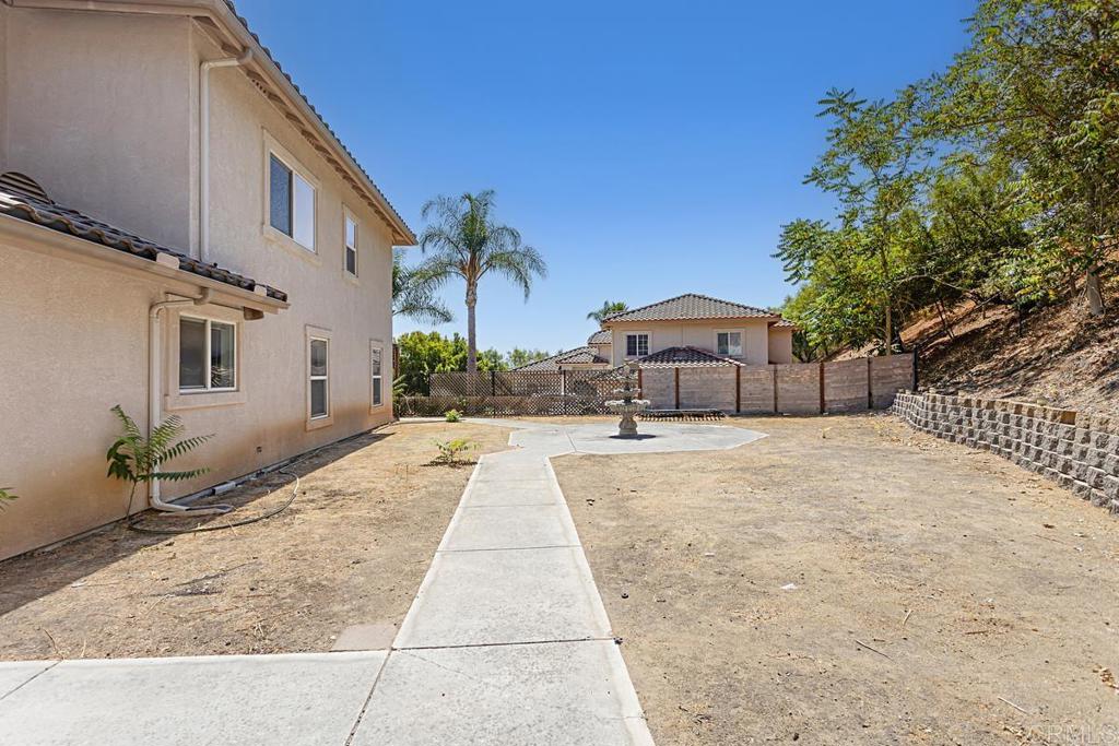 1691 Hubbard Place Escondido, CA 92027 - Photo 39 of 39 a house with yard and a outdoor space