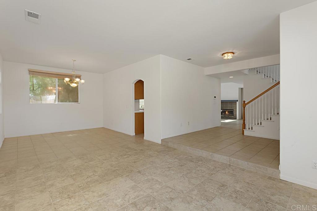 1691 Hubbard Place Escondido, CA 92027 - Photo 4 of 39 a view of an empty room with a window