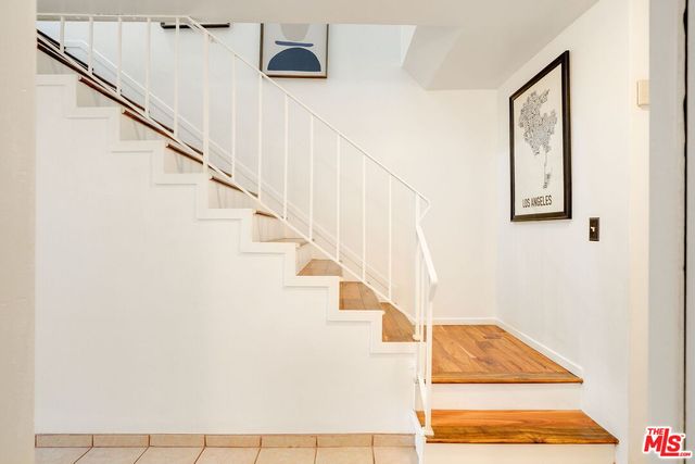 a view of staircase with white walls and white walls