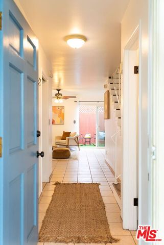 a view of a living room with a bed