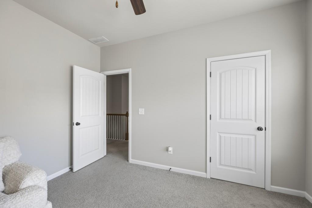 660 Country Ridge Drive Hoschton, GA 30548 - Photo 31 of 58 a view of an empty room