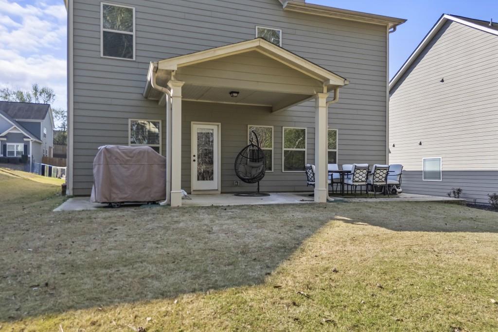 660 Country Ridge Drive Hoschton, GA 30548 - Photo 45 of 58 a view of a house with backyard