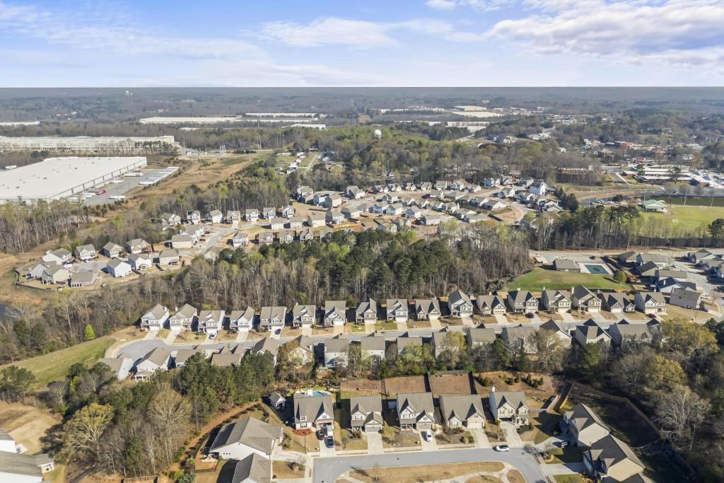 660 Country Ridge Drive Hoschton, GA 30548 - Photo 51 of 58 an aerial view of residential building with parking space