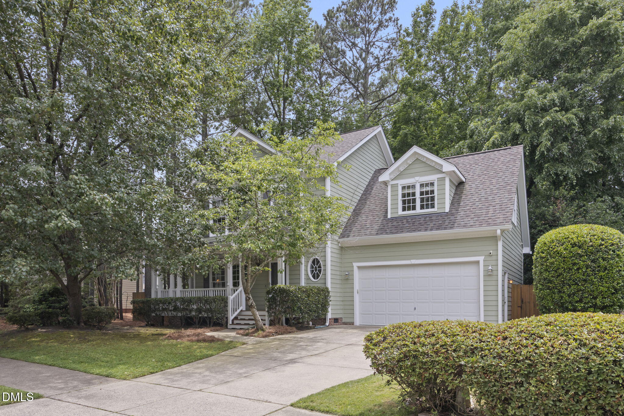 1008 Scotts Ridge Trail Apex, NC 27502 - Photo 3 of 57 a front view of a house with garden