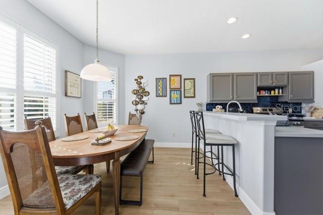1338 Southwest 161st Place Ocala, FL 34473 - Photo 19 of 76 a view of a dining room with furniture and window