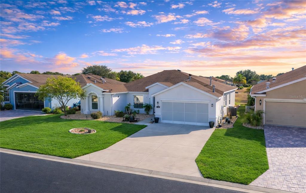 1338 Southwest 161st Place Ocala, FL 34473 - Photo 2 of 76 front view of a house with a yard