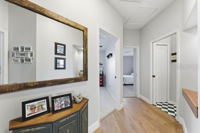 1338 Southwest 161st Place Ocala, FL 34473 - Photo 21 of 76 a bedroom with furniture and a mirror