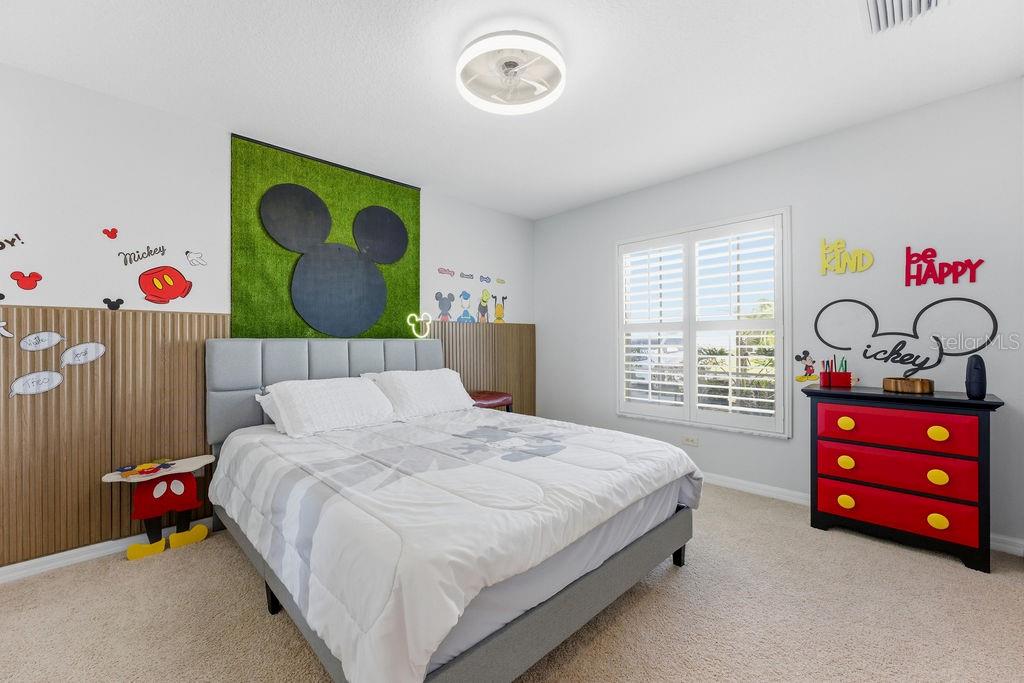 1338 Southwest 161st Place Ocala, FL 34473 - Photo 33 of 76 a bedroom with a bed and a window