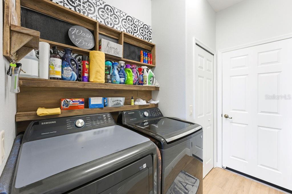 1338 Southwest 161st Place Ocala, FL 34473 - Photo 39 of 76 a utility room with dryer and washer