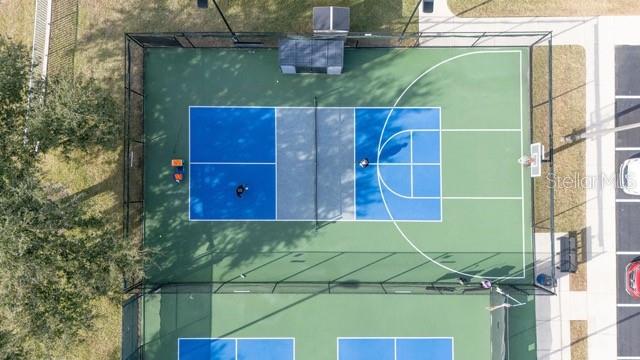 1338 Southwest 161st Place Ocala, FL 34473 - Photo 57 of 76 a view of a brick house with a small yard