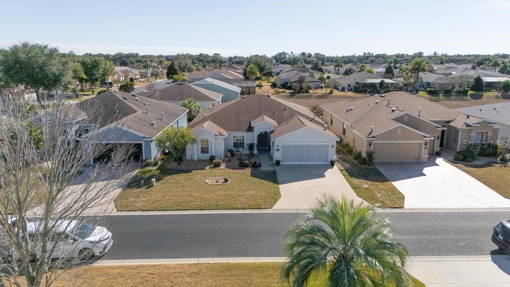 1338 Southwest 161st Place Ocala, FL 34473 - Photo 70 of 76 an aerial view of a house with a garden and lake view