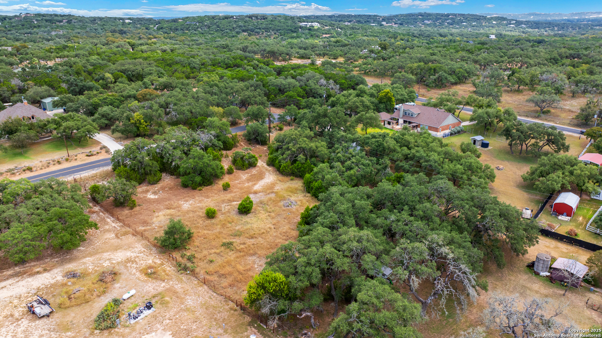32311 Koch Road Bulverde, TX 78163 - Photo 4 of 14 a view of a house with a yard