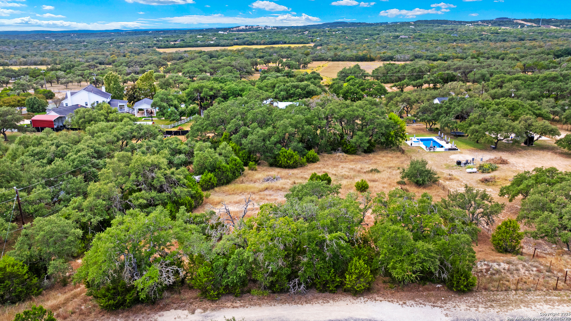 32311 Koch Road Bulverde, TX 78163 - Photo 9 of 14 a view of a lake with a mountain